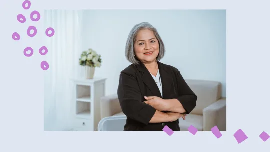 a woman smiling and confident at work