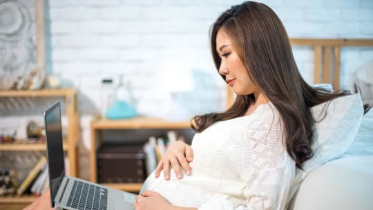 Pregnant woman reading