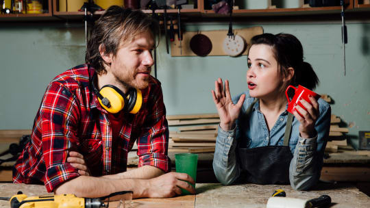 Woman and man carpenters