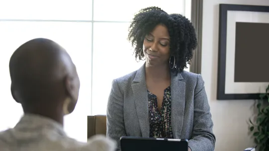 manager and employee holding a performance review