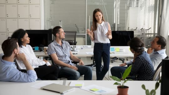 Woman leading meeting