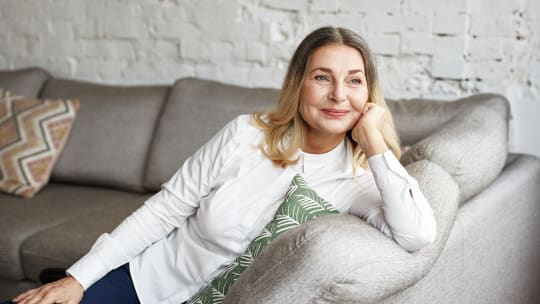 woman relaxing on the couch at home