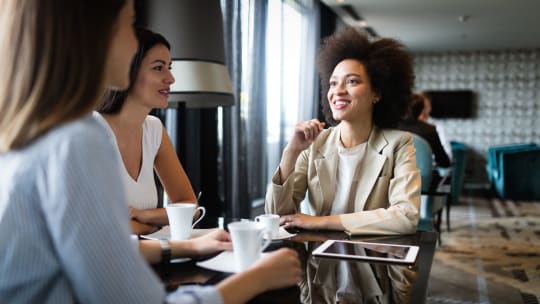 Woman talking to friends
