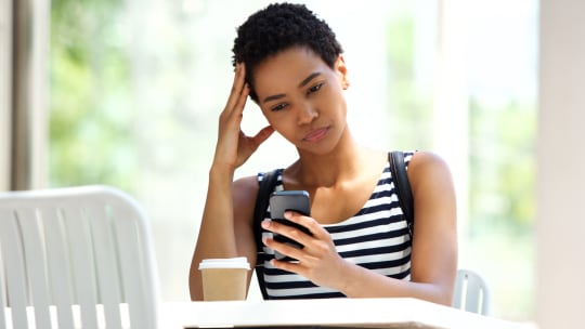 Sad woman on phone
