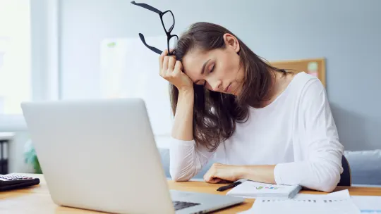 Woman sad at desk
