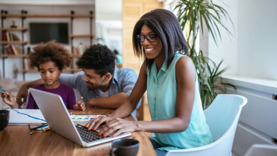 Woman working on a laptop