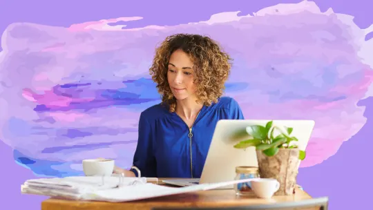 Woman working at desk.
