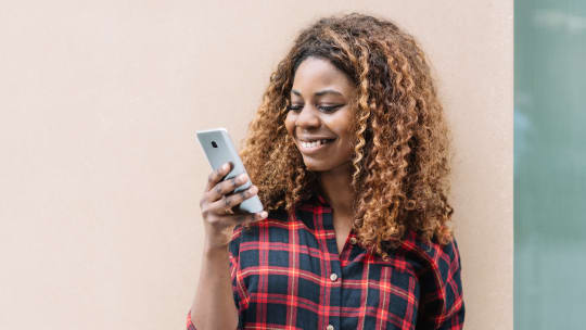 woman checking fertility app
