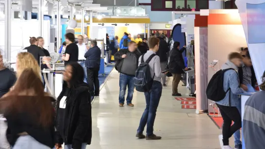students at a crowded career fair