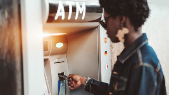 Woman withdrawing money