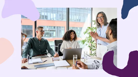 people working together happily in an office