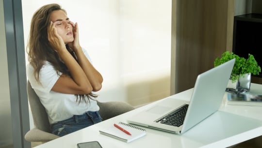Frustrated woman at work