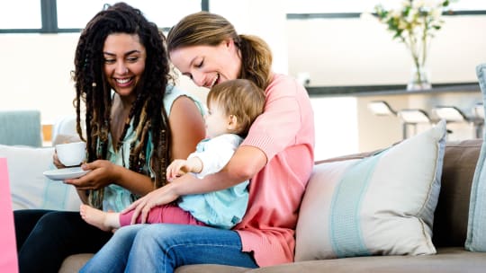 Women Taking Care of Child