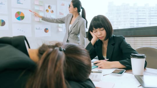 Woman Leading Boring Meeting