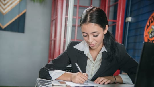 woman completing work visa application