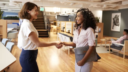 Women shaking hands