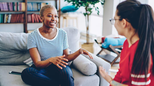 Woman talking to friend