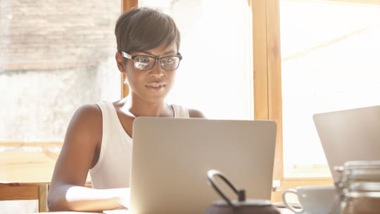 data analyst on laptop