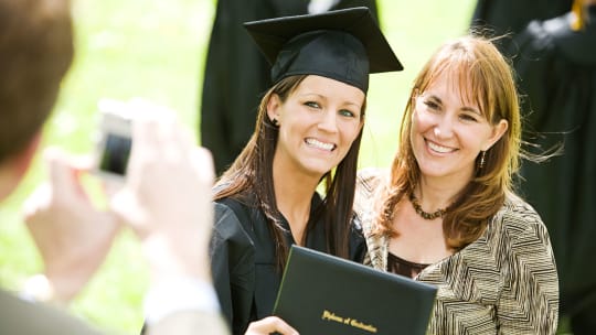 Woman posing for graduation photo