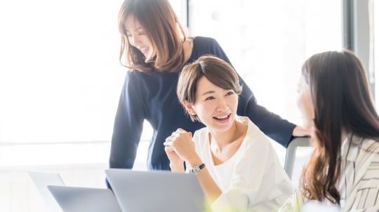 Women Talking at Work