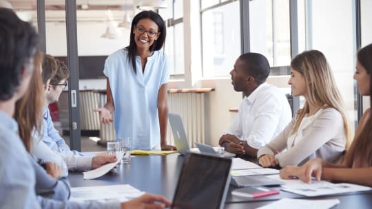 Woman leading meeting