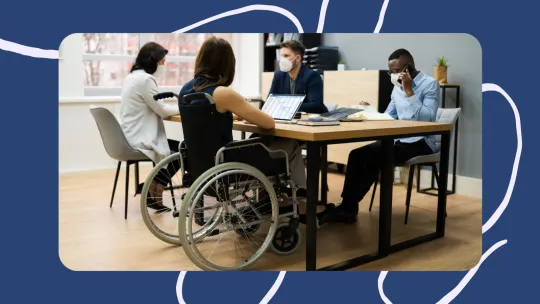 members of a team working at a table