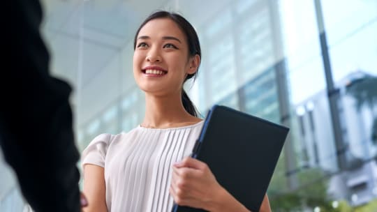 business woman handshake