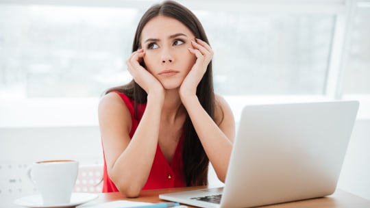Frustrated woman at work