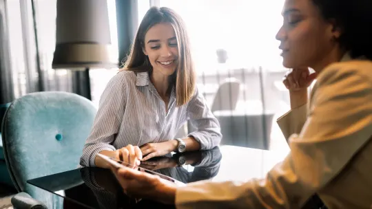 Women in an informational interview