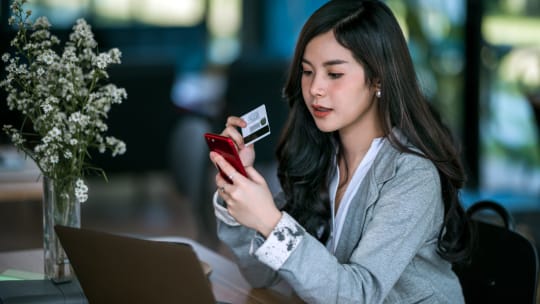 Woman Checking Credit Score Online