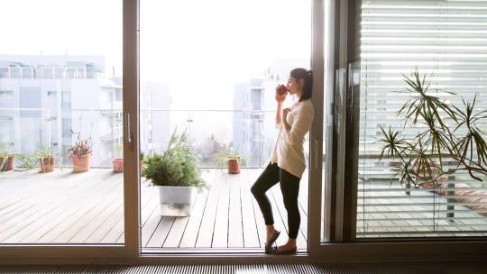 Woman reading in hammock