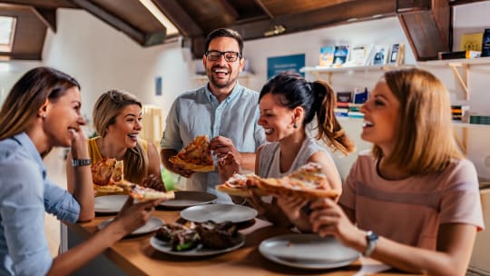 Coworkers eating at work