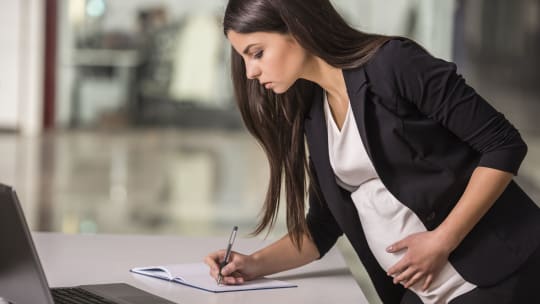 Pregnant woman at work