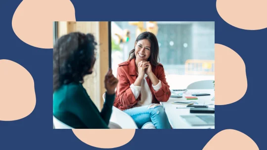women talking at work