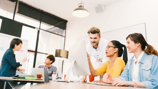 Diverse employees in a row