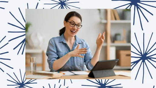 a woman talking to a computer.