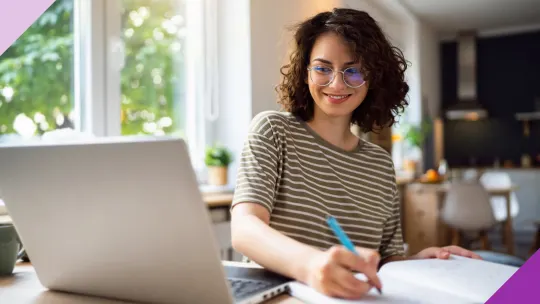 A dedicated person studying on a computer, illustrating the value of developing high-income skills.