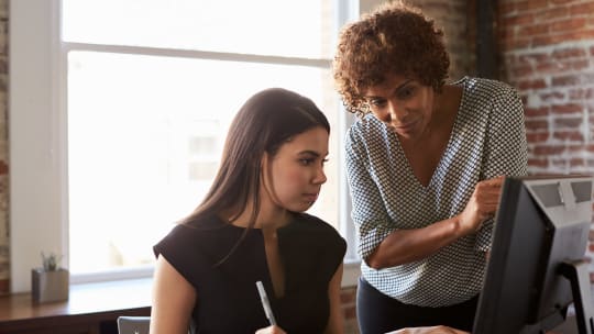 manager working with employee