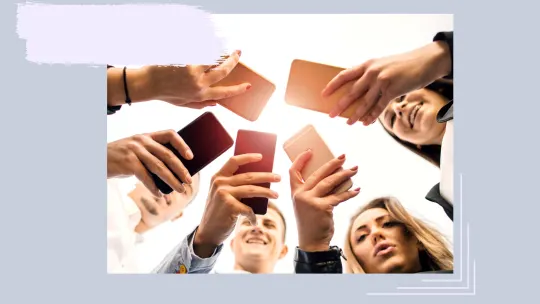 a group of people on their phones