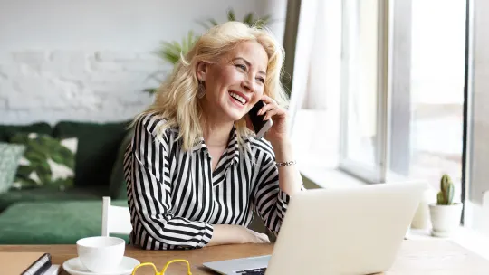Woman typing on computer