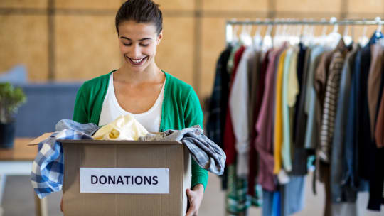 woman holding donation box