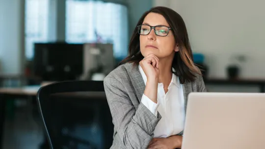 woman thinking at work