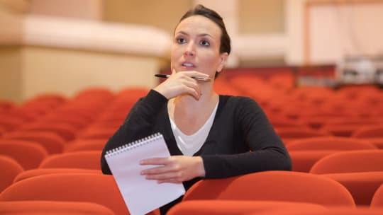 stage manager taking notes