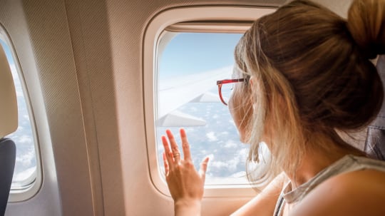 Woman on a  plane