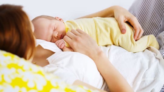 woman holding baby