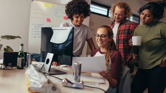 Women around a computer