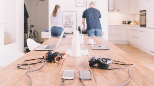 woman wearing headphones at work