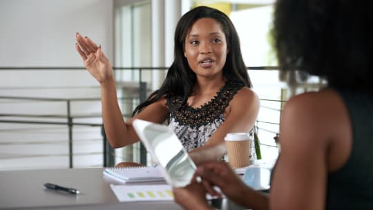 Woman meeting with colleague