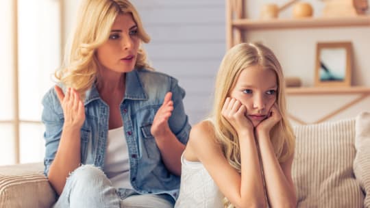 young girl with an attitude and mother scolding