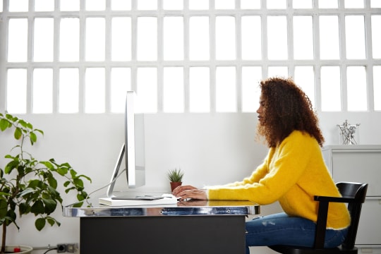 Women works at her desk